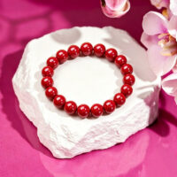 natural red cinnabar bracelet on white background for protection