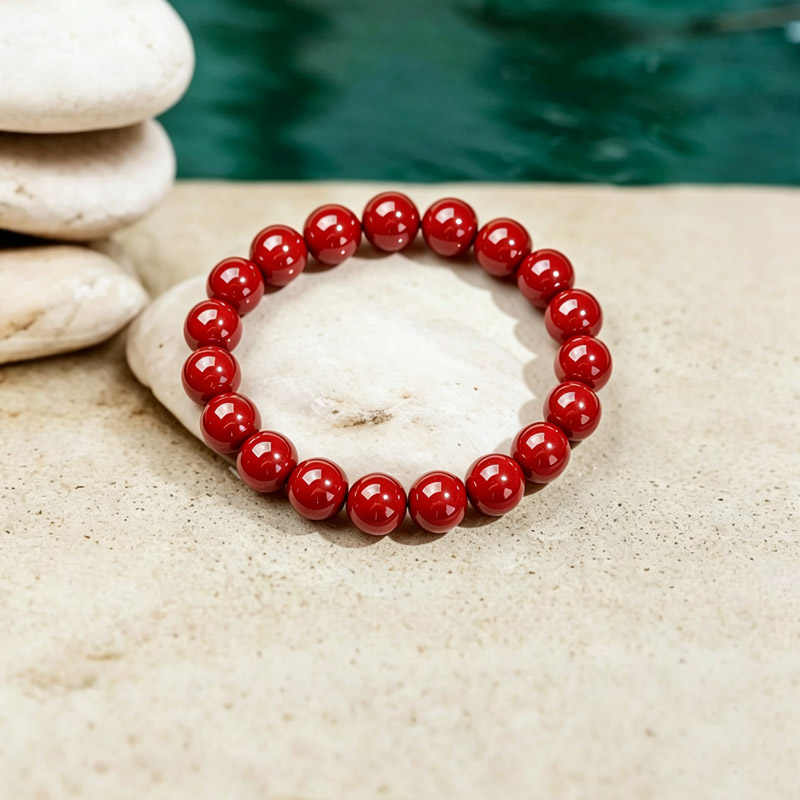 cinnabar bracelet side 01 round cinnabar beads bracelet lay flat for grounding and calm